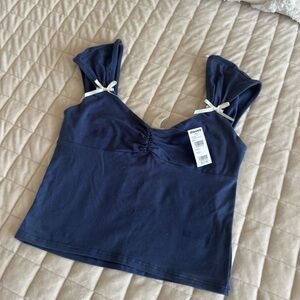 Stylish Navy Top with Bow Accents